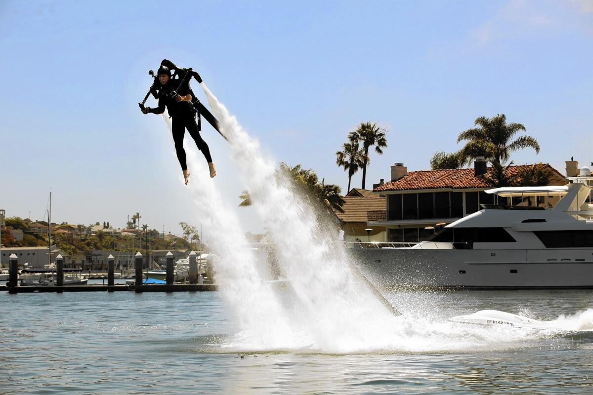 Water jetpacks use seawater to propel users into the air. Newport Beach residents near the habor have expressed concerns over jetpacks' safety and noise.