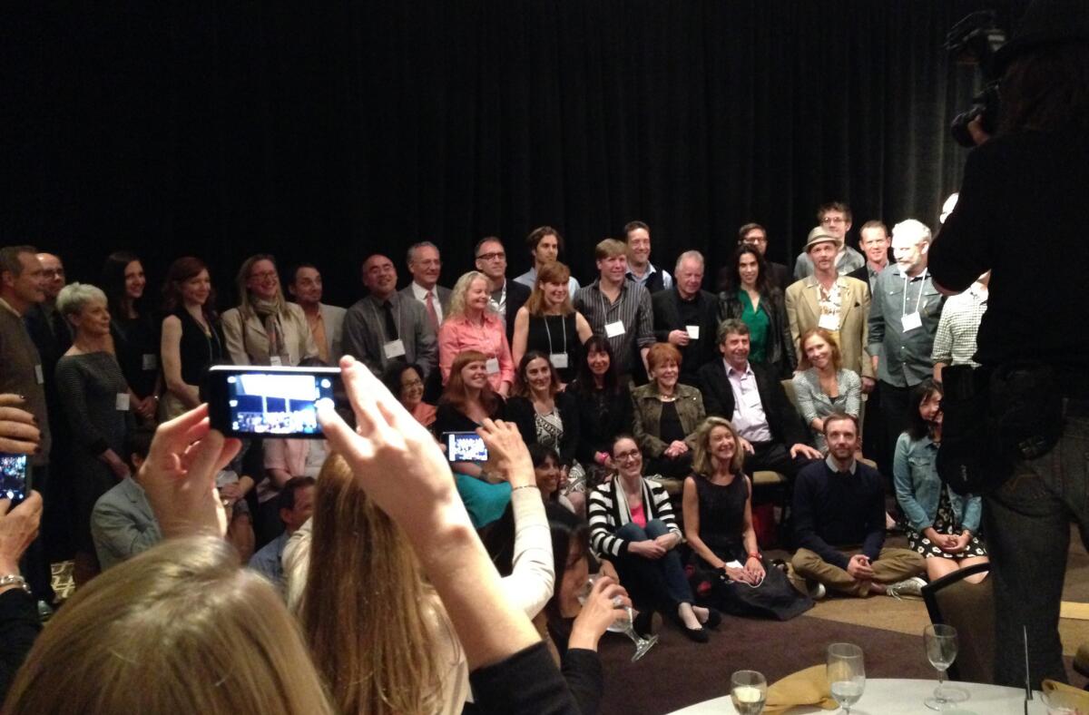 Authors pose for a group photo after the 2013 SCIBA dinner.