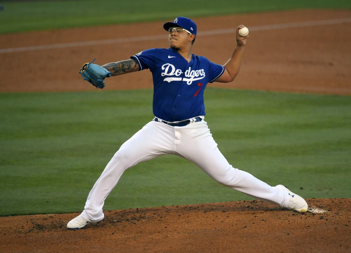 Dodgers starting pitcher Julio Urías throws during an intrasquad game in June 2020.