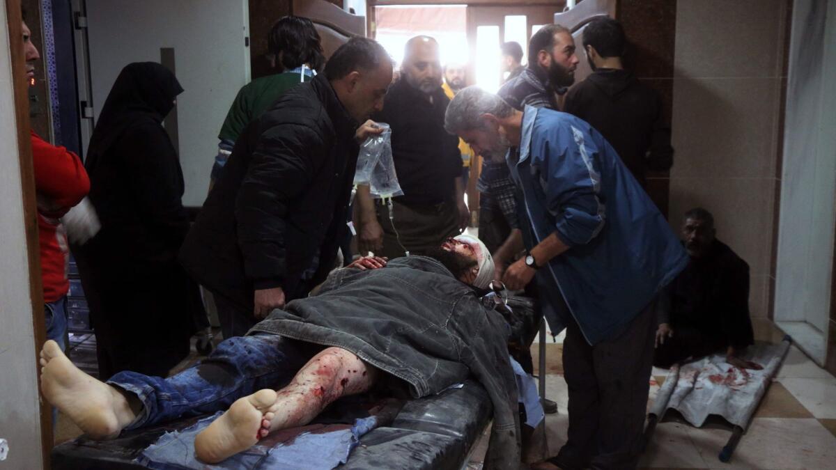 A Syrian receives treatment at a makeshift hospital in eastern Aleppo as government aircraft and artillery pounded neighborhoods in the rebel-held east on Nov. 18, 2016.