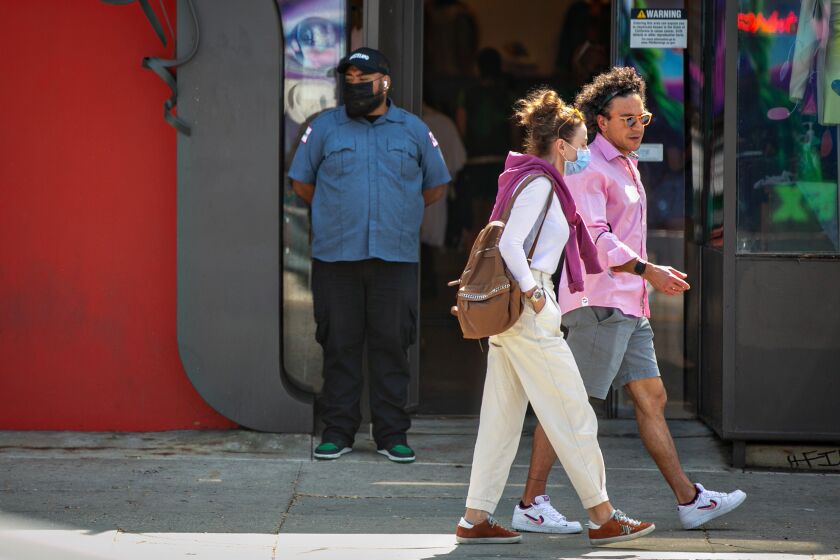 LOS ANGELES, CA - SEPTEMBER 17: Businesses on the Melrose strip are hiring security guards because of the uptick in armed robberies in the area on Friday, Sept. 17, 2021 in Los Angeles, CA.(Jason Armond / Los Angeles Times)
