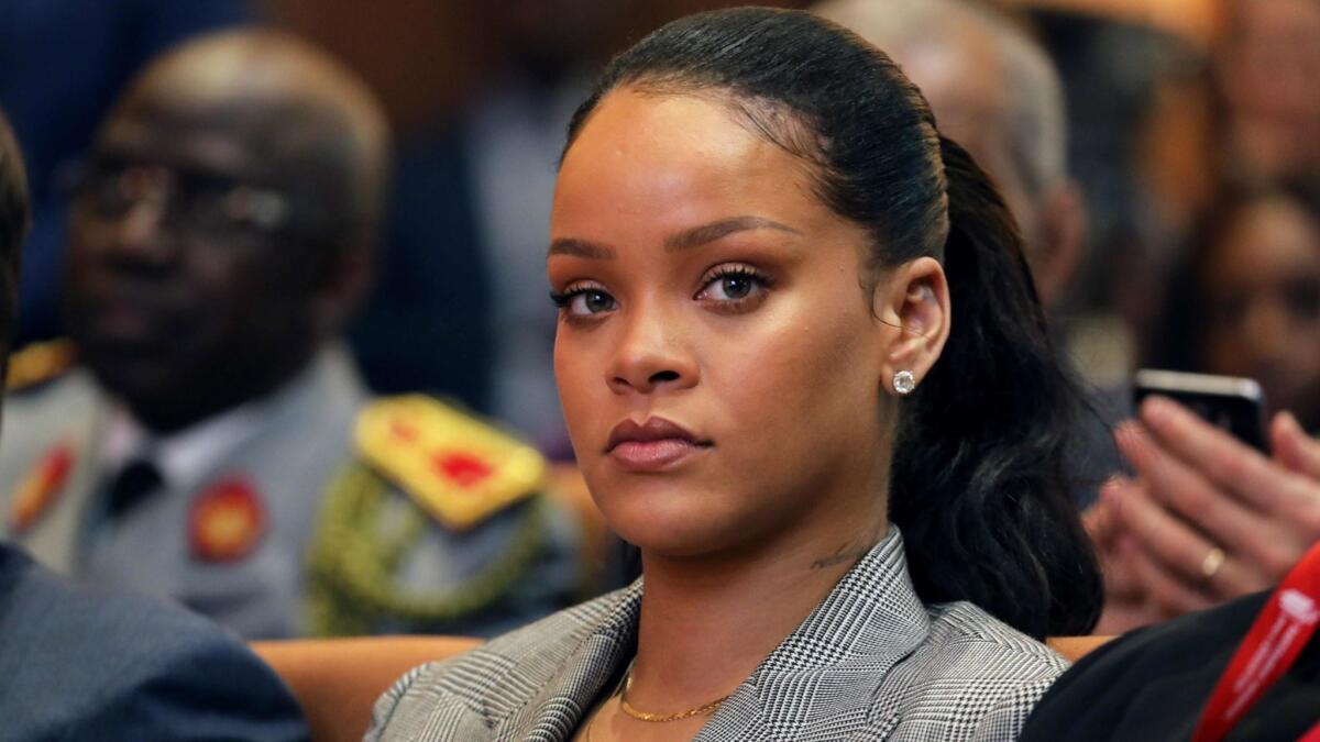 Rihanna said that by running a gaming company's ad that asked Snapchat users to decide whether they wanted to slap her or punch Chris Brown, Snap insulted victims of domestic violence.