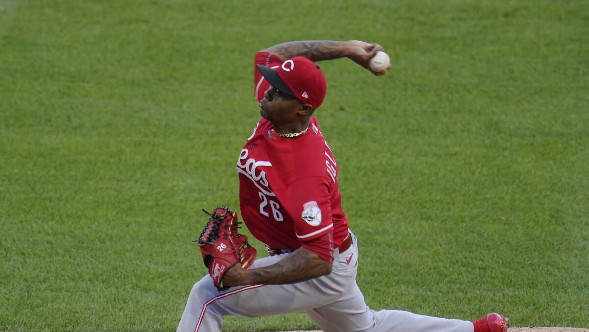 Cincinnati Reds closer Raisel Iglesias delivers during a game.