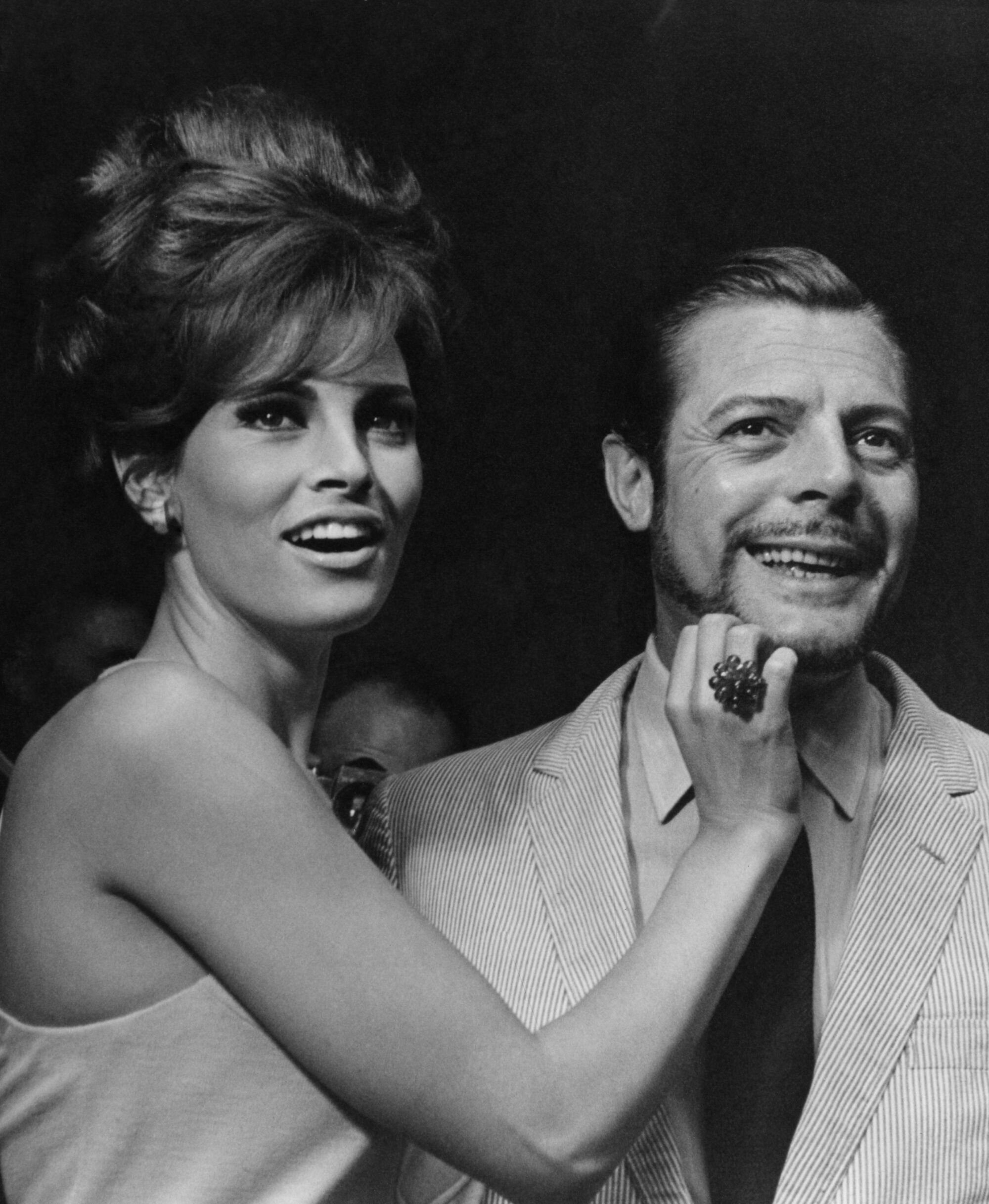 Young Hollywood actress Raquel Welch touches the beard Italian actor Marcello Mastroianni 