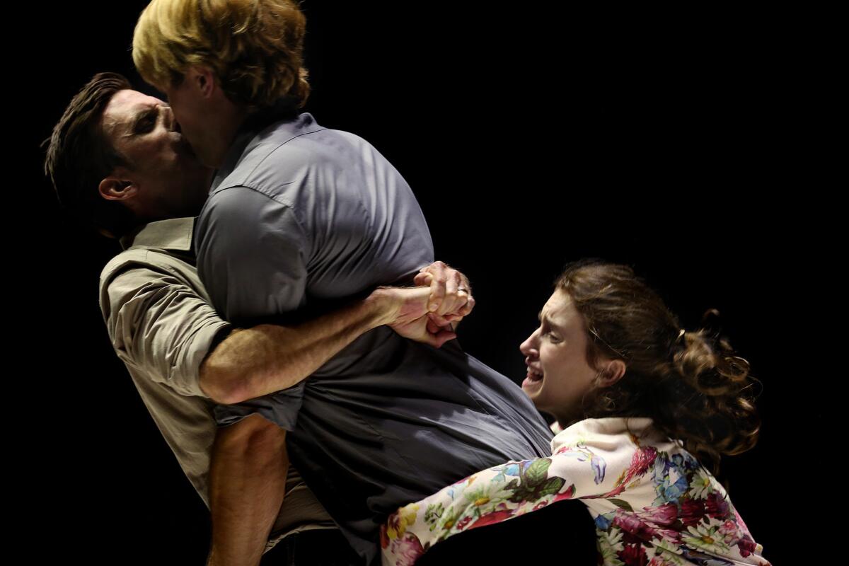 Frederick Weller, left, Dave Register and Catherine Combs in a run-through of Arthur Miller's "A View From the Bridge" at the Ahmanson Theatre.