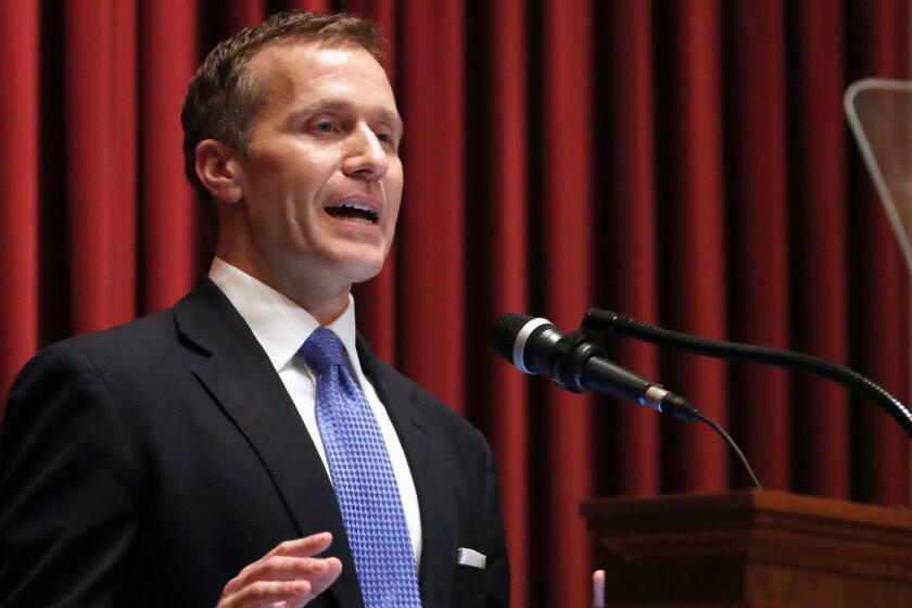 FILE - In this Jan. 10, 2018, file photo, Missouri Gov. Eric Greitens delivers the annual State of the State address to a joint session of the House and Senate in Jefferson City, Mo. Responding to a news report that overshadowed his annual address, Greitens acknowledged he's been "unfaithful" in his marriage but denied allegations that he blackmailed the woman to stay quiet. The Republican governor and his wife released a statement late Wednesday, after a report that he had a sexual relationship with his former hairdresser in 2015. (AP Photo/Jeff Roberson, File)
