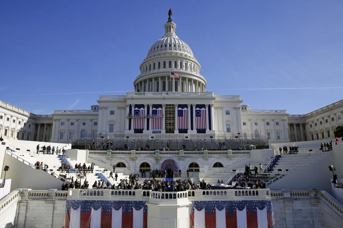 The U.S. Capitol frames the backdrop over the stage during a rehearsal of President-elect Donald Trump's swearing-in ceremony in Washington, D.C., in this file photo taken on Jan. 15, 2016.