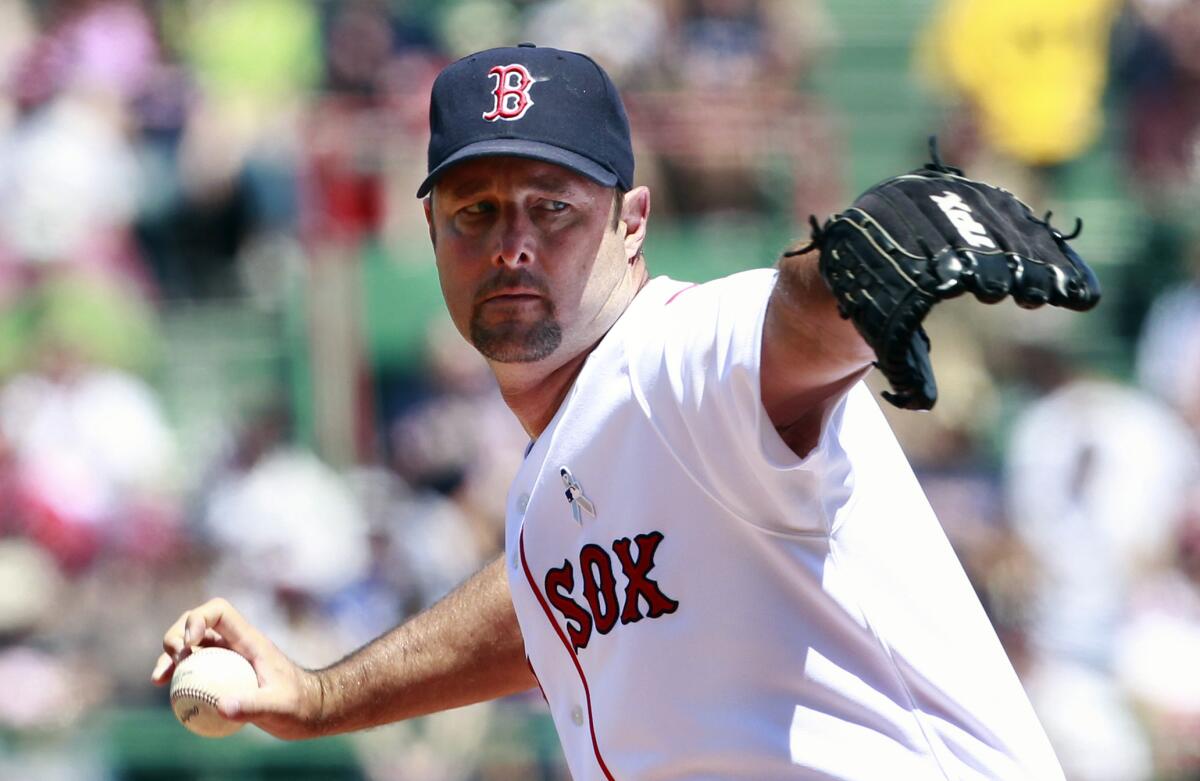 Boston Red Sox's Tim Wakefield pitches in the first inning of an interleague baseball game.