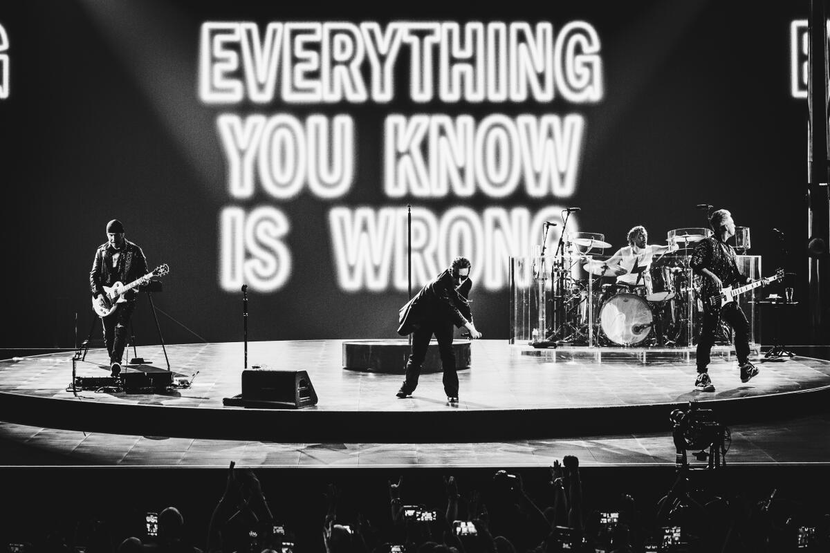 U2 performs at Sphere in Las Vegas while the words 'Everything you know is wrong' appear behind them on screen..
