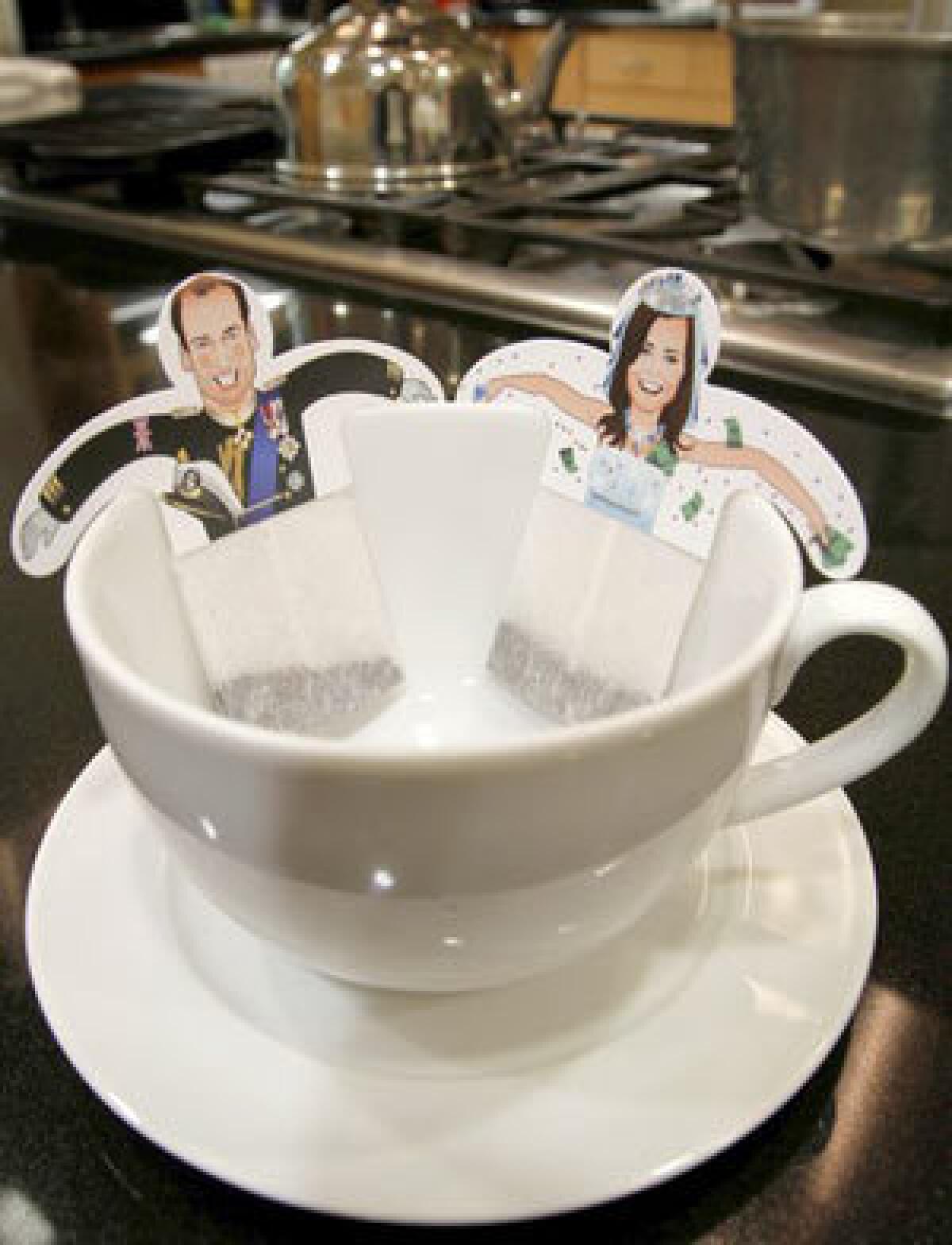 The KaTEA & William greeting card comes with tea bags topped with cutouts of the royal couple.