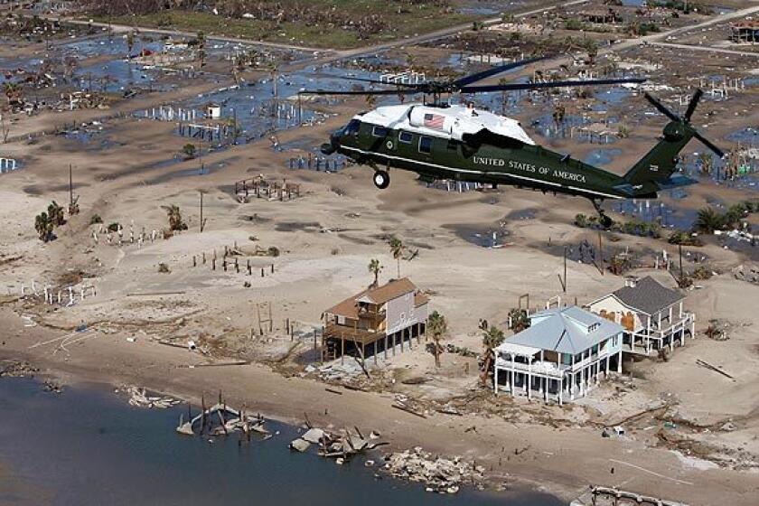 Marine One, with President Bush aboard, takes an aerial tour of the damage from Hurricane Ike near Galveston, Texas.