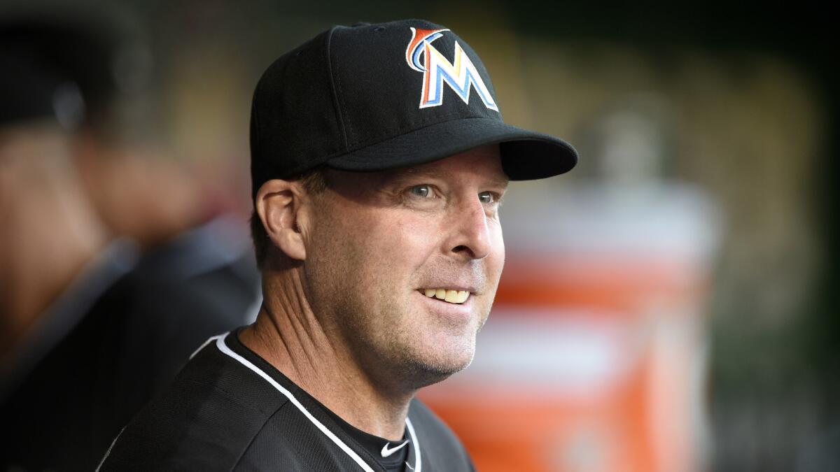 Miami Marlins Manager Mike Redmond looks on from the dugout during a game against the Washington Nationals on May 4.