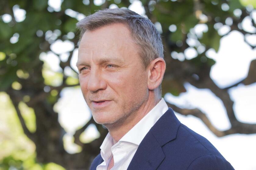 Actor Daniel Craig poses for photographers during the photo call of the latest installment of the James Bond film franchise, currently known as 'Bond 25', in Oracabessa, Jamaica, Thursday, April 25, 2019. (AP Photo/Leo Hudson)