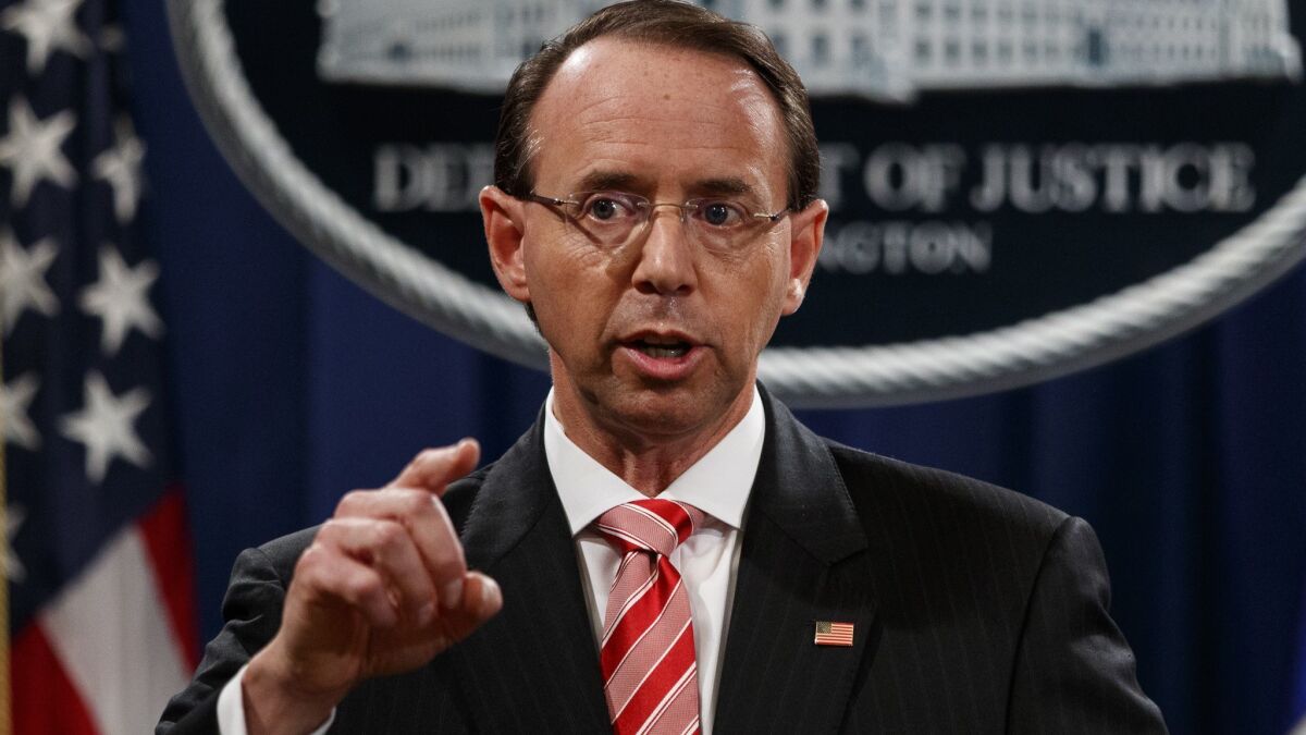 Deputy Atty. Gen. Rod Rosenstein speaks during a news conference on the indictment of 12 Russian intelligence officers on July 13.