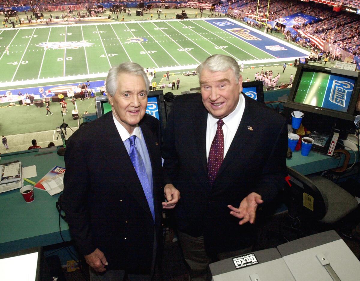 John Madden, right, with Fox broadcast partner Pat Summerall before Super Bowl XXXVI in New Orleans.