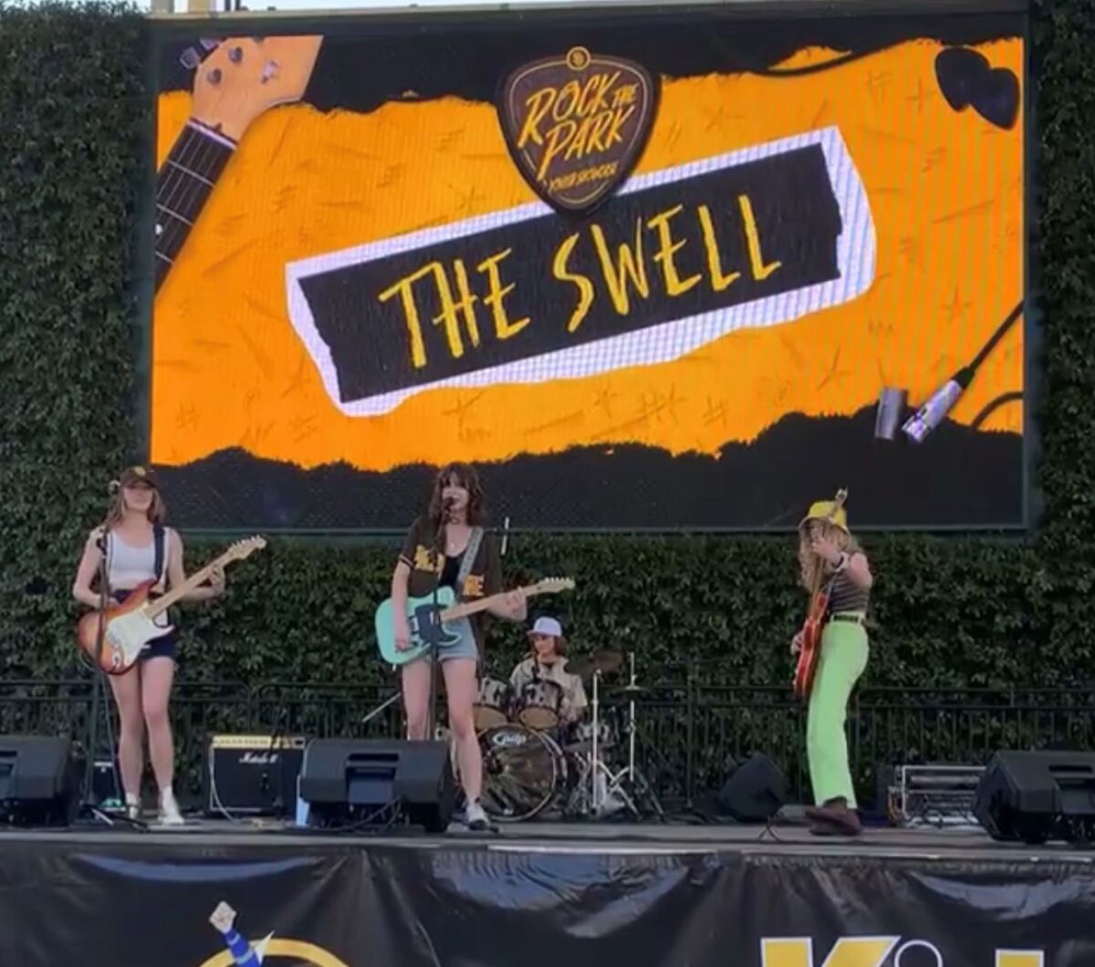 The Swell band performing at Petco Park.