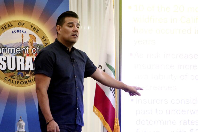 California State Insurance Commissioner Ricardo Lara discusses what his department is doing to help folks in high wildfire risk areas keep their home fire insurance, in Grass Valley, Calif., Thursday, Aug. 22, 2019. (Elias Funez/The Union via AP)