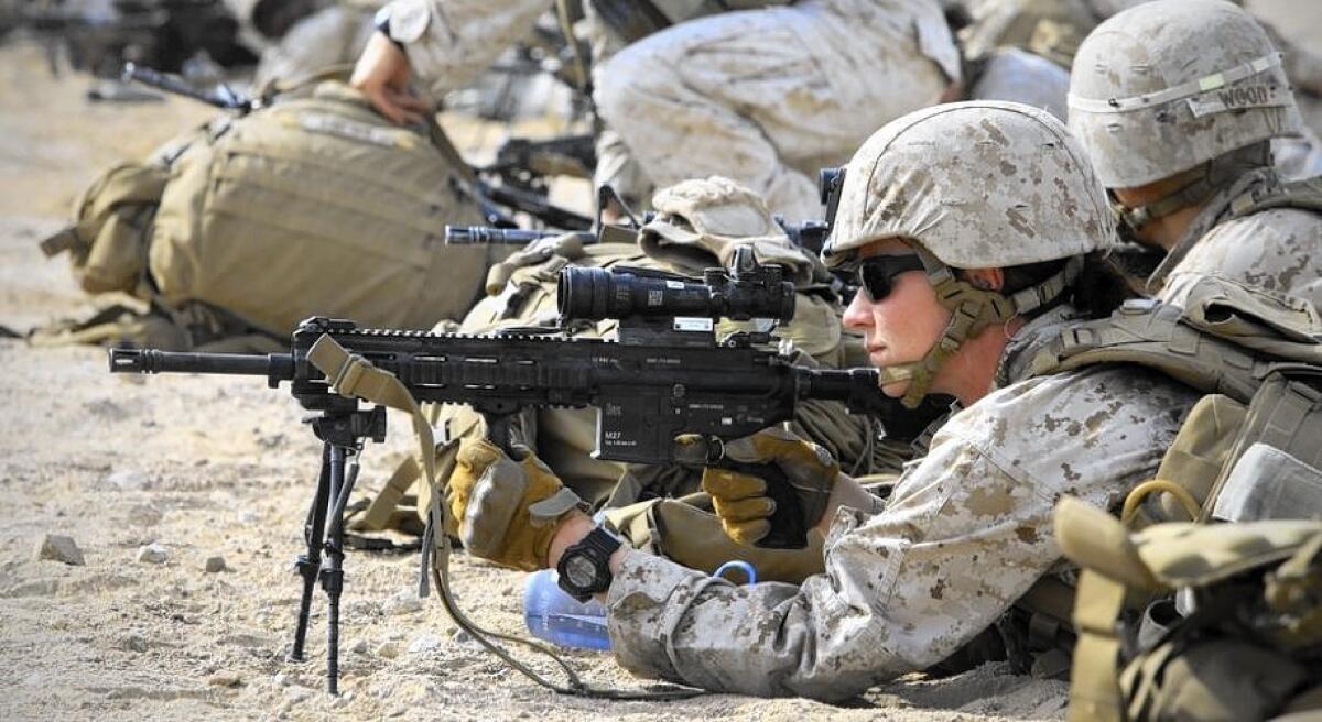 Sgt. Kelly Brown was assessed at the Twentynine Palms combat center as part of the Marine Corps task force on women in combat. The findings were criticized by advocates of expanding opportunities for women in the military.
