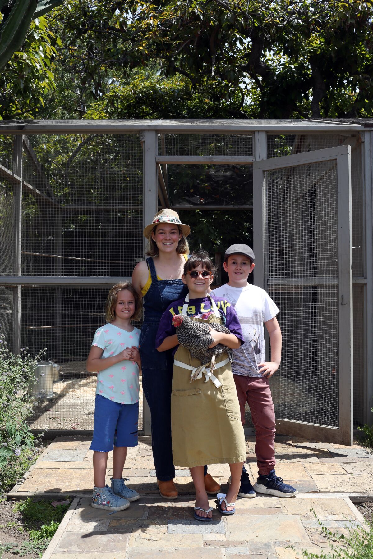 Alison Hersel and her children, Abby, Nellie and Nathan, on their farm in Malibu. 