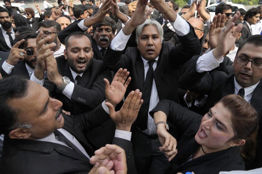 Lawyers chant slogans during a rally against the recent increase in electricity and fuel prices and demanding the announcement of parliamentary election, in Lahore, Pakistan, Thursday, Sept. 21, 2023. Pakistan's election oversight body announced on Thursday that it will hold the next parliamentary elections in the last week of January, delaying the vote which was to be held in November under the constitution. (AP Photo/K.M. Chaudary)