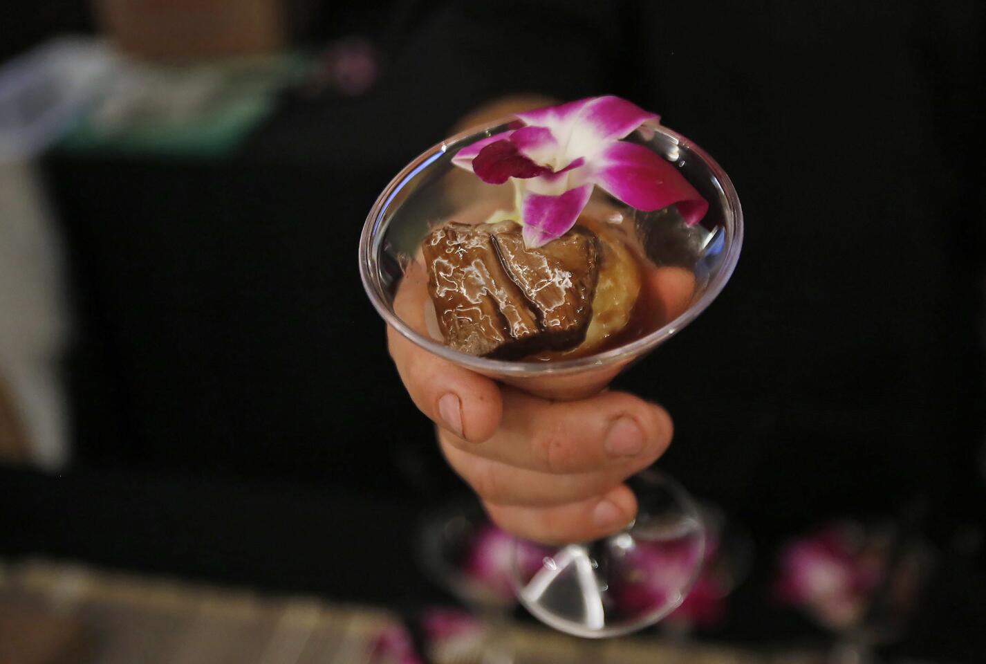 A short rib served over Yukon gold potato in a martini glass was among the items from the Bungalow restaurant available to guests at the Newport Beach Restaurant Week kickoff party Thursday night. Restaurant Week will run Monday through Jan. 27.