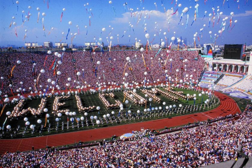 The 1984 Summer Games in Los Angeles were the modern prototype of a profitable Olympics. Above, the opening ceremonies at the Coliseum.