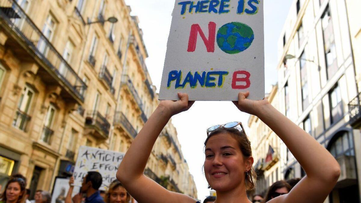 Demonstrators call for action to fight climate change during a march in Bordeaux, France, on Oct. 13.