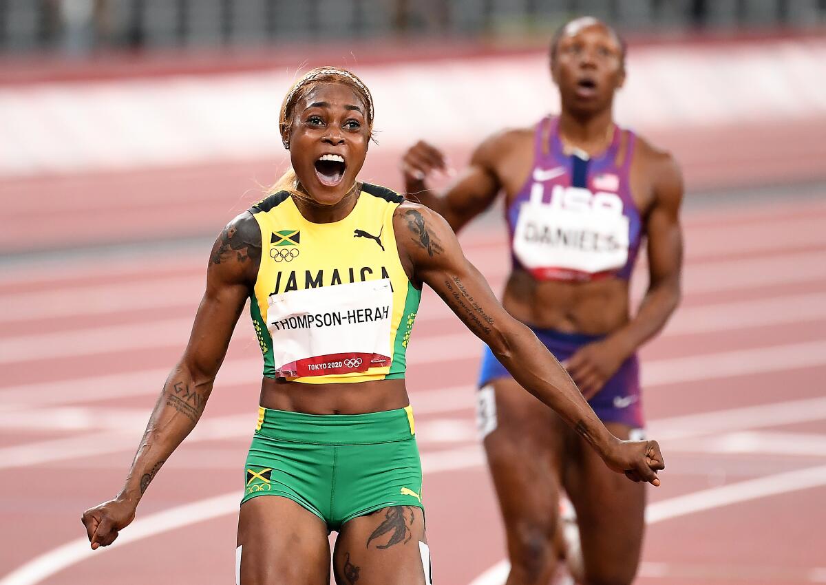 Jamaica's Elaine Thompson-Herah celebrates