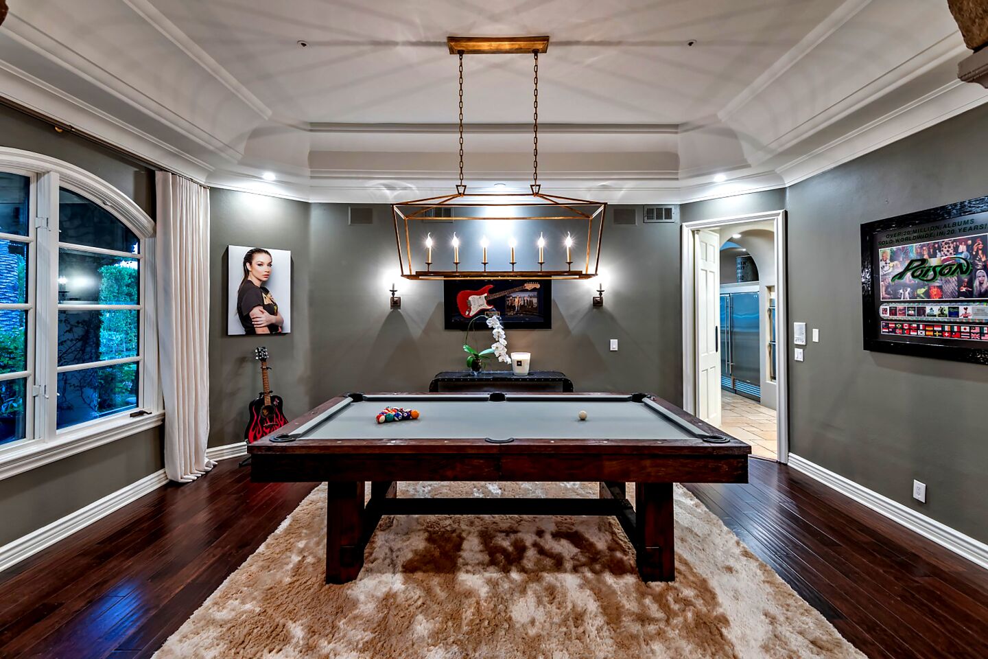 The amenity-loaded home includes a billiards room.