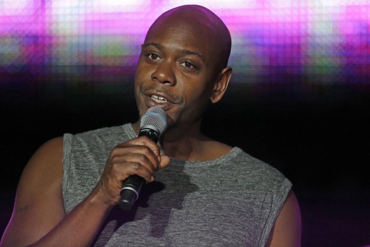 Santa Fe police say a man tossed a banana peel at Dave Chappelle during a show, hitting the comedian in the leg. Above, Chappelle performs in New Orleans in July 2014.