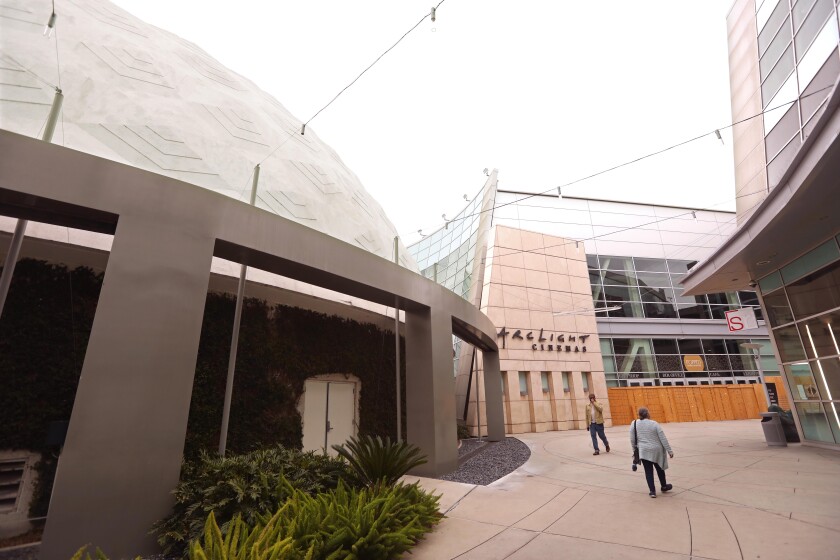 Passersby on the walkway from the Cinerama Dome to the larger ArcLight Cinemas building.