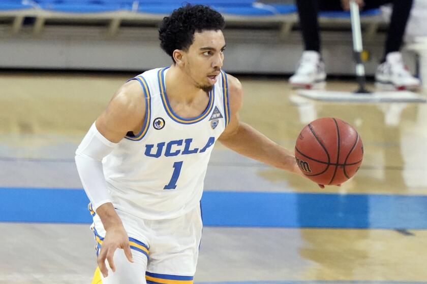 UCLA guard Jules Bernard dribbles during a game against Colorado on Jan. 2, 2021, in Los Angeles.