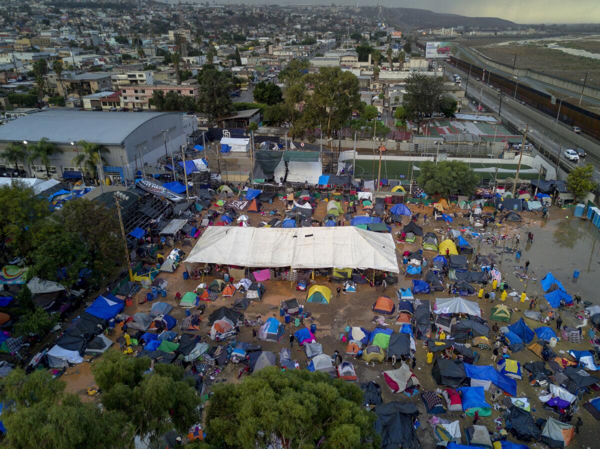 Thursday rain storm left the temporary shelter flooded through out with very few dry spots for the migrants from Central America who have traveled with the caravan and arrived in Tijuana, Mexico.