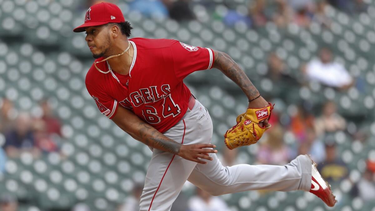 Angels pitcher Felix Pena throws in the seventh inning against the Detroit Tigers on Thursday in Detroit.