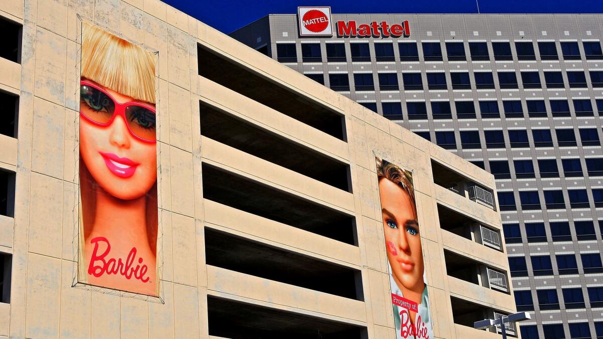 Pictures of Barbie characters adorn Mattel's offices in El Segundo.