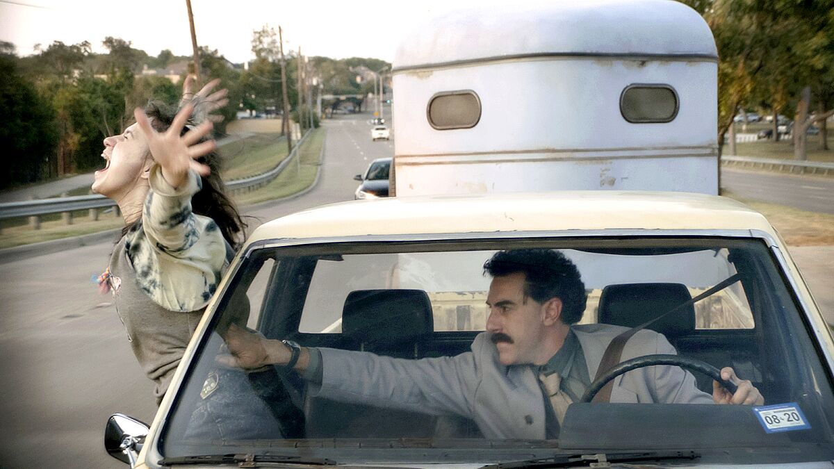 Sacha Baron Cohen and Maria Bakalova in "Borat Subsequent Moviefilm" movie