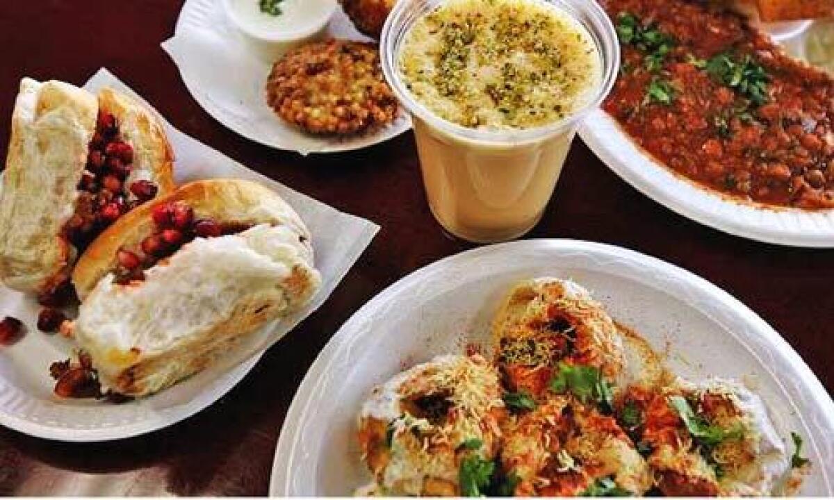 (Clockwise from left) Dabeli, Sabudana Vada, Piyush, Pav Bhaji, and Dahi Batata Puri are served at Mumbai Ki Galliyon Se in Artesia.