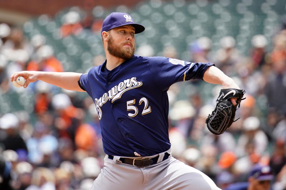Jimmy Nelson delivers during a game between the Milwaukee Brewers and San Francisco Giants in June.