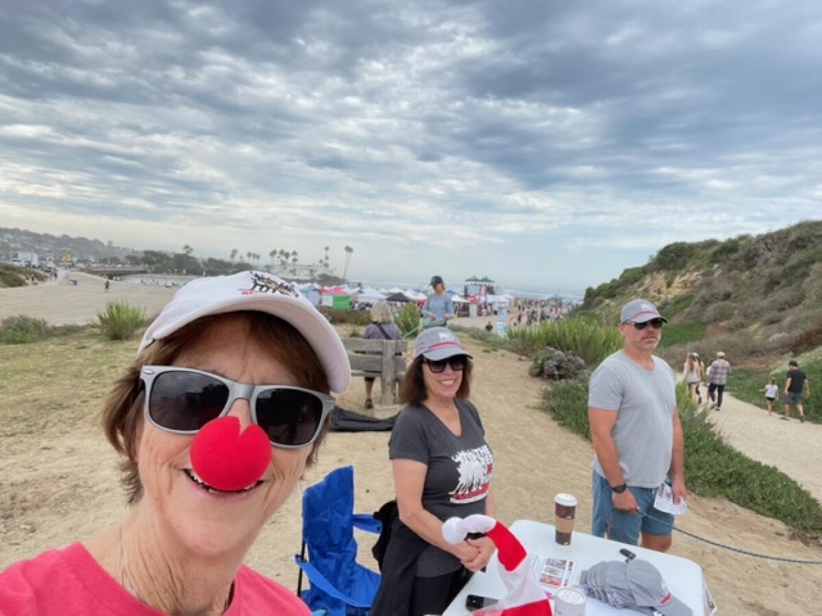 Members of The Red Nose Run team at the Sept. 10 Helen Woodward Surf Dog Surf-A-Thon event in Del Mar.