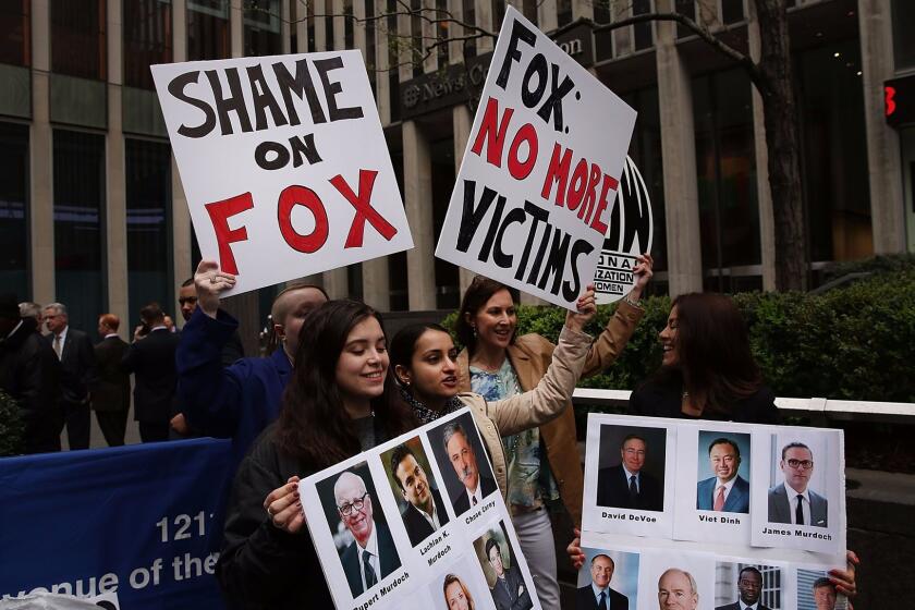 NEW YORK, NY - APRIL 20: Members of the National Organization of Women (NOW) protest outside of Fox headquarters a day after the popular television network fired host Bill O'Reilly on April 20, 2017 in New York City. O'Reilly was fired following several allegations of sexual harassment against him. The activists believe there is still a rampant culture of sexual harassment at the network. (Photo by Spencer Platt/Getty Images) ** OUTS - ELSENT, FPG, CM - OUTS * NM, PH, VA if sourced by CT, LA or MoD **