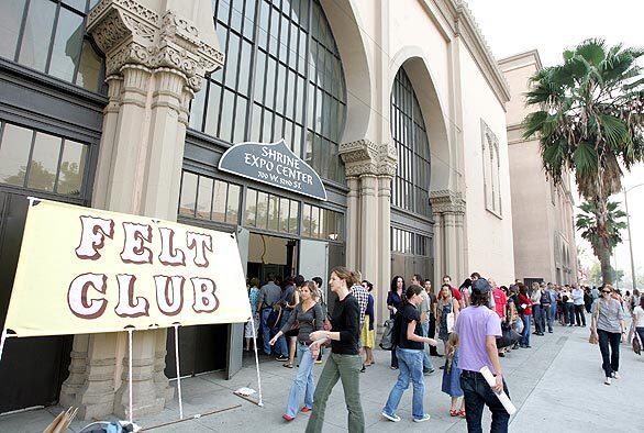 People queued up for the Felt Club craft show and sale Nov. 16 at L.A.'s Shrine Auditorium Expo Center. The economy may be tanking, but for Southern California's community of crafters, the future is looking surprisingly plush. The Felt Club show drew about 4,500 shoppers, who perused 144 booths jammed with homemade housewares, cute crocheted critters and stuffed felt cupcakes. The events success is just the latest proof that a long-simmering national movement continues to grow, and old-fashioned crafts are being revived in fresh ways among the under-40 set.