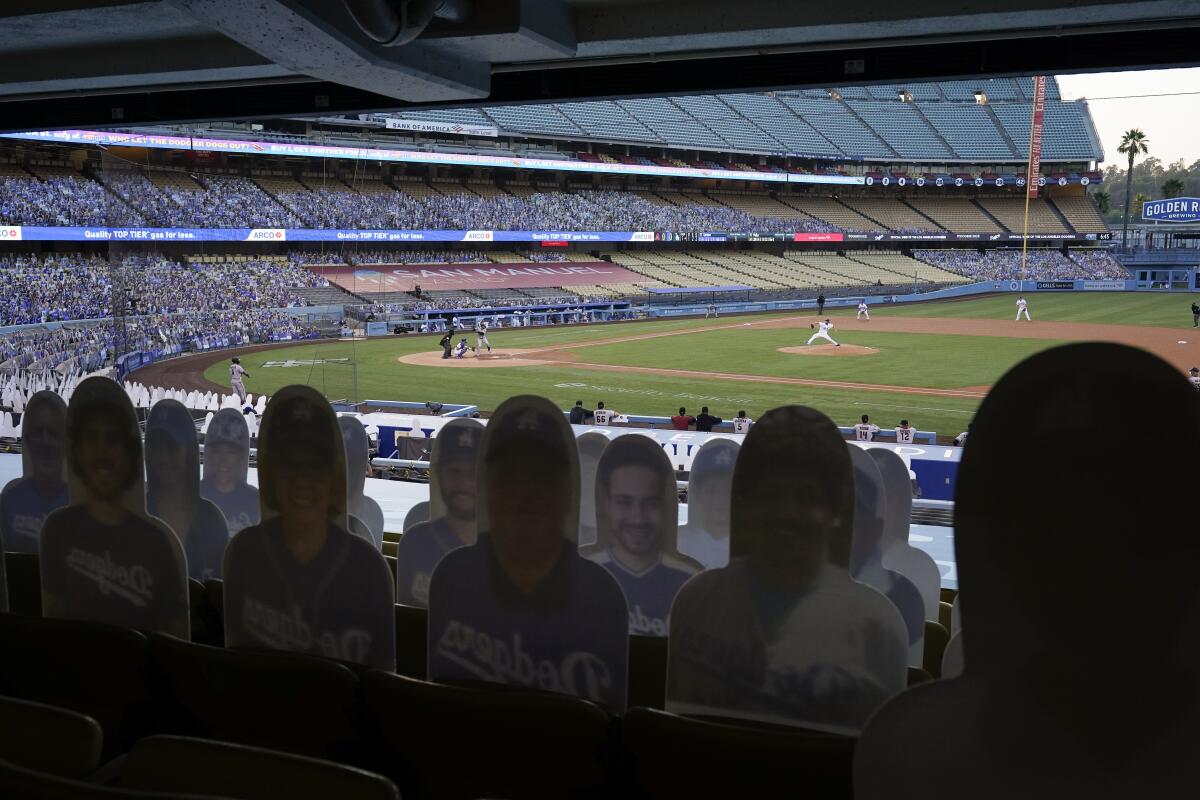Cutouts of fans were placed in the stands at Dodger Stadium last season