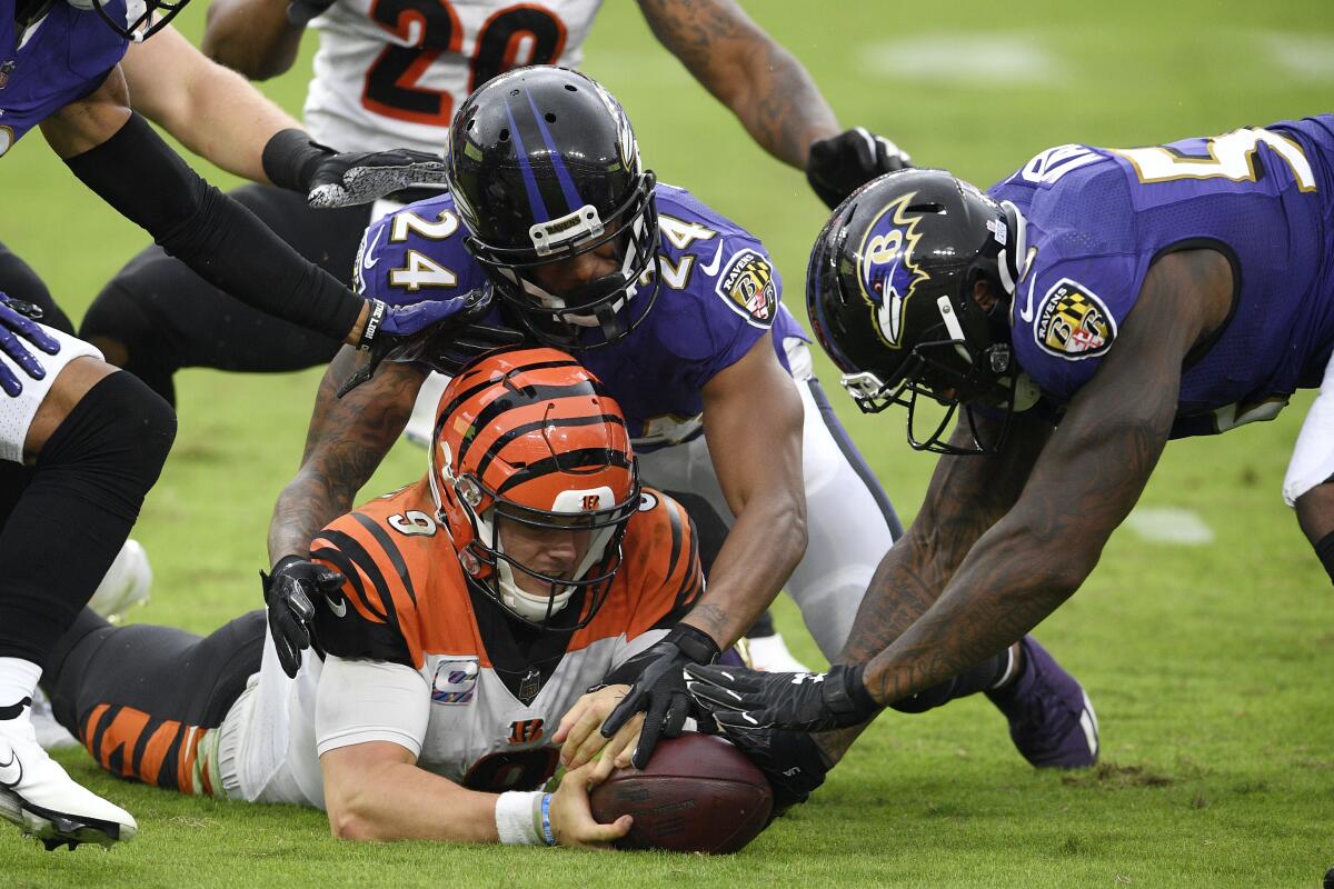 Burrow finds Ravens D to be painful experience - The San Diego Union-Tribune