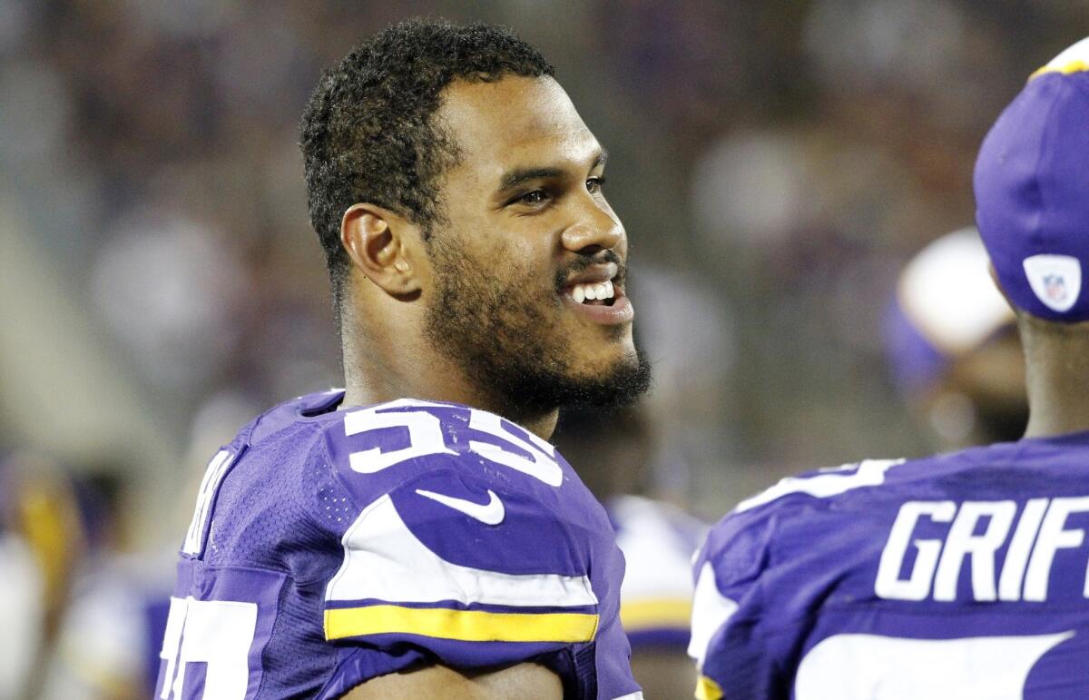 The Vikings' Anthony Barr talks to a teammate during an NFL preseason football game against the Arizona Cardinals Aug. 16 in Minneapolis.