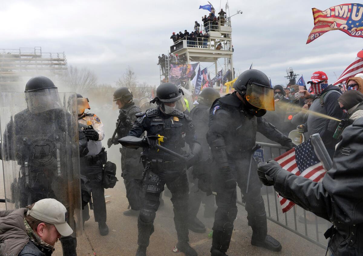 The pro-Trump mob clashes with police and security forces as they storm the U.S. Capitol on Jan. 6.
