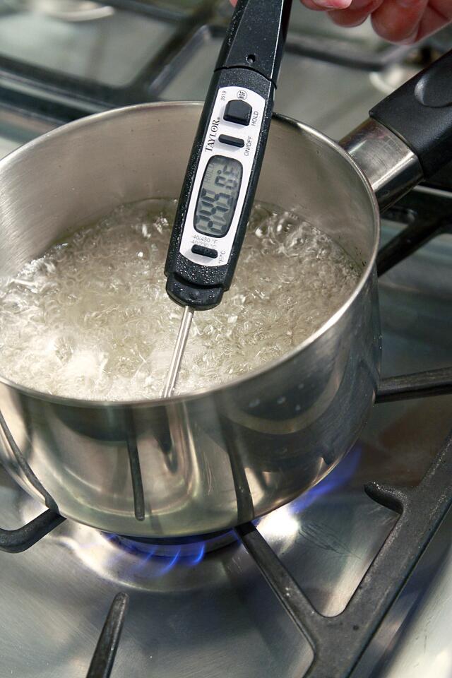 Cook sugar syrup until it reaches 240 degrees on a candy thermometer.