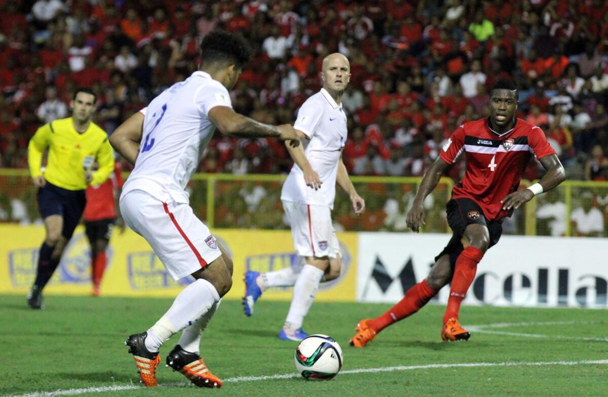 U.S. DeAndre Yedlin, left, prepares to kick the ball during a CONCACAF World Cup qualifier against Trinidad and Tobago on Nov. 17.