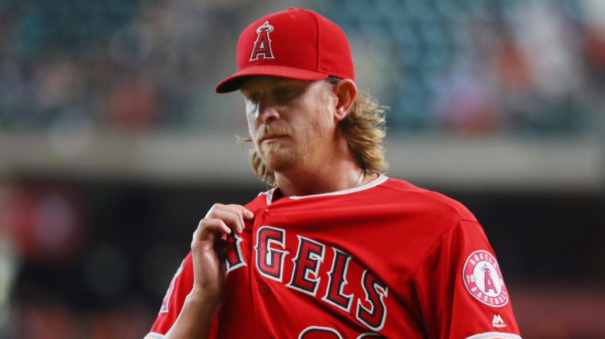 Angels pitcher Jered Weaver heads to the dugout after the second inning of a game against the Houston Astros on July 23.