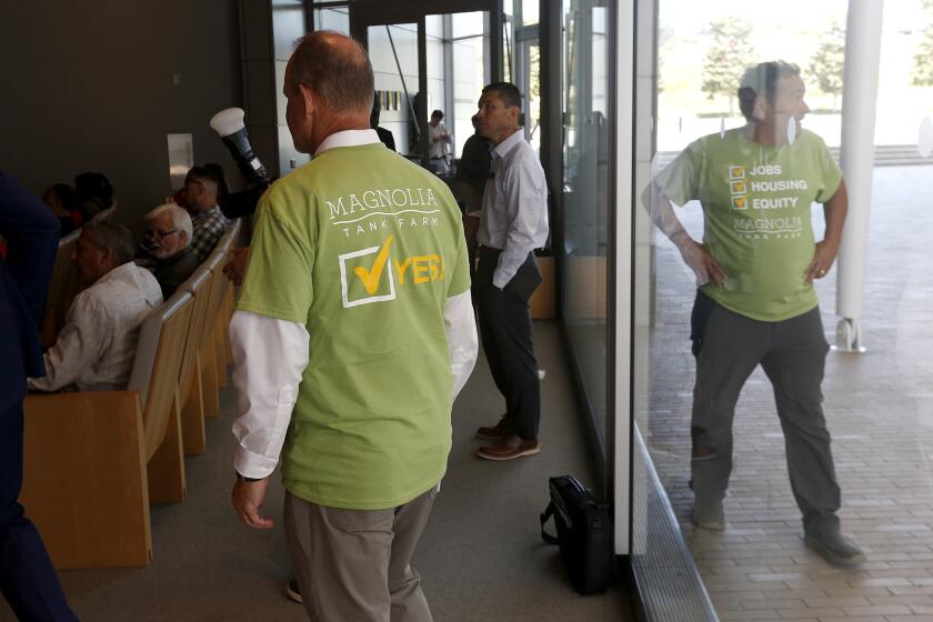 The California Coastal Commission holds its monthly meeting at the Newport Beach City Council chambers where supporters for the Magnolia Tank Farm prepare to speak on Thursday in Newport Beach.