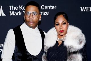 Nelly and Ashanti attend the 25th Annual Mark Twain Prize For American Humor